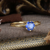 6 Prong Round Cut Sapphire Timeless Solitaire Engagement Ring with Twisted Band